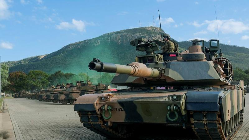 An Australian Army M1A2 Abrams Main Battle Tank from 2nd Cavalry Regiment provides security during the D Squadron raising ceremony at Lavarack Barracks, Townsville, Queensland.