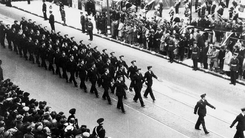 10 Squadron marches in a Victory in Europe Day parade on May 9, 1945, in Plymouth, United Kingdom.