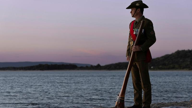 Anzac Day didgeridoo player, Australian Army Warrant Officer Class 2 Lachlan Youll, at Anzac Cove on the Gallipoli Peninsula, Türkiye.