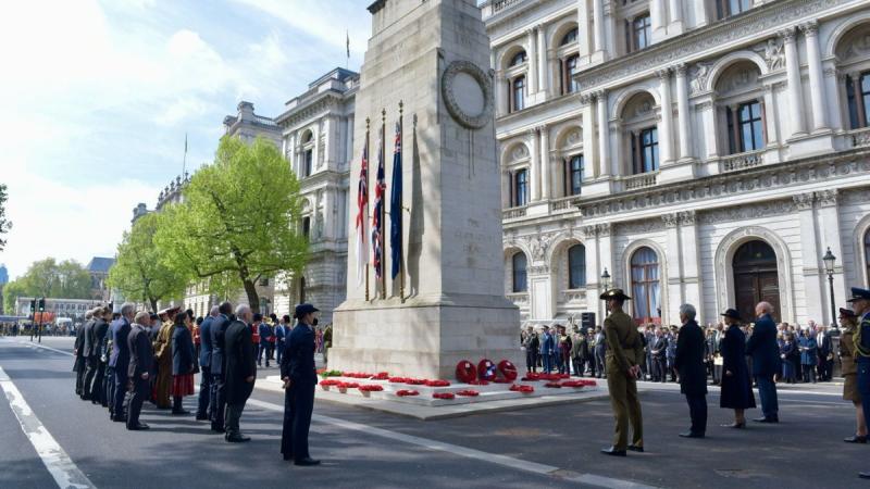 People attend the cenotaph service at Whitehall, UK, on Anzac Day.
