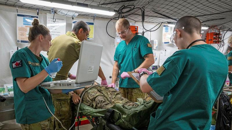 Medical staff from 3rd Health Battalion treat a simulated casualty during rehearsals as part of Exercise Balikatan in Palawan, Philippines.
