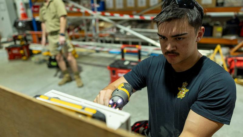 Royal Australian Air Force Leading Aircraftsman Curtis Bachmann deployed as part of the Field Installation Team (FIT) for Operation Accordion conducts equipment familiarisation training at Al Minhad Air Base, United Arab Emirates.