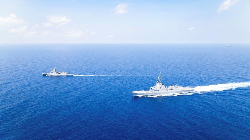 HMAS Sydney, right, sails in company with Philippine Navy ship BRP Antonio Luna during a multilateral maritime cooperative activity. Photo: Leading Seaman David Cox