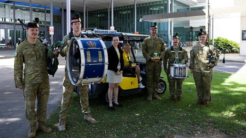 Australian Army soldiers from the 3rd Battalion, The Royal Australian Regiment, present a donation to Brighter Lives at Townsville University Hospital, Queensland. 