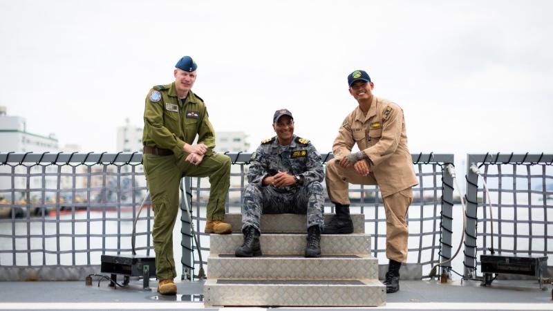Royal Canadian Air Force Lieutenant Commander Brian Brook, Royal Australian Navy Lieutenant Commander Andrew Frugtniet and United States Navy Lieutenant Makiling deployed to Japan in support of the United Nations Security Council Resolution Enforcement Coordination Cell.