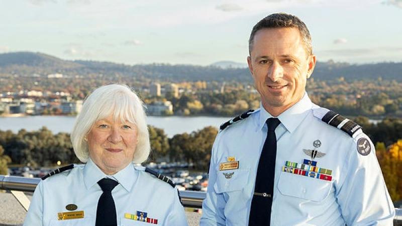 Air Vice-Marshal Harvey Reynolds presents Wing Commander Robyne Green with her Federation Star at Russell Offices, ACT.