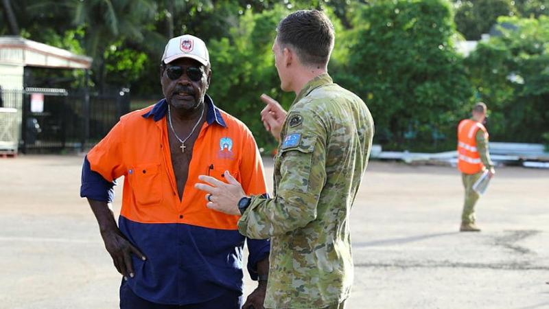 Corporal Dylan Booth, from 6th Engineer Support Regiment, works with local council member Les Pitt, Divisional Engineer Officer to Erub (Darnley) Island Council, under the Army Alian (previously Aboriginal) Community Assistance Program (AACAP).