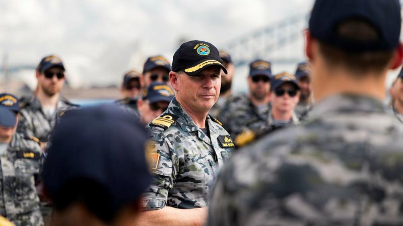 Chief of Navy, Vice-Admiral Mark Hammond, talks with HMAS Brisbane’s ship’s company during a clear lower deck alongside Fleet Base East in Sydney.