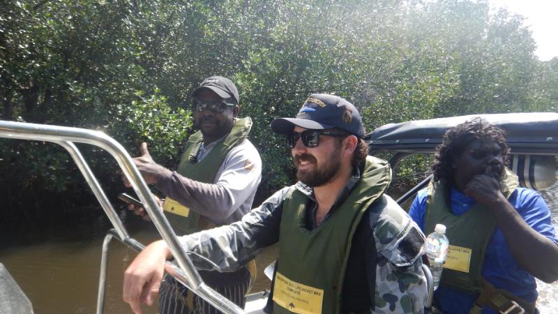 Able Seaman Sean Lee, of ADV Cape Fourcroy, works with Mardbalk Marine Rangers Ralstin Djurloin and Runeil Mauruli during a joint patrol along the Arnhem coast.