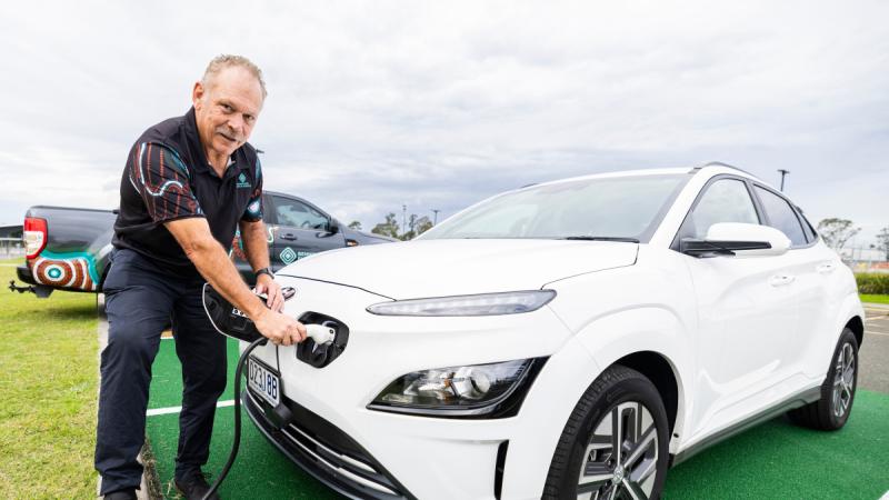 Cliff Lyons, managing director of Bennelong Energy Services, introduces electrical vehicle chargers at Joint Logistic Unit East - Moorebank.