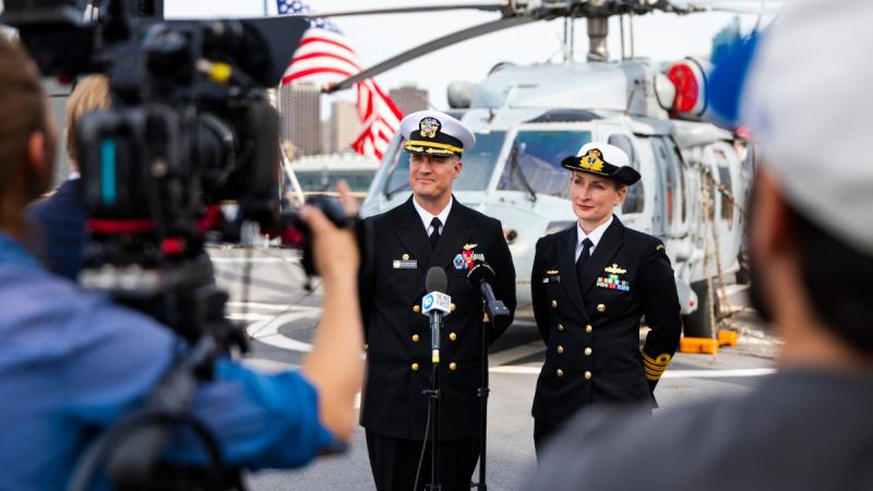 Commanding Officer USS Blue Ridge, Captain Nick DeLeo, and Commanding Officer HMAS Kuttabul, Captain Rebecca Levitt, meet media at Fleet Base East in Sydney.