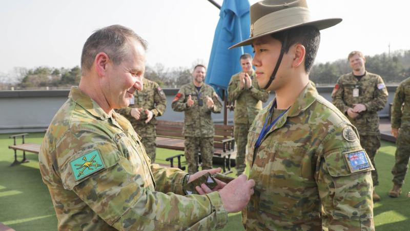 Australian Army soldier Corporal Hyun Kim is promoted by Commander 1st (Australian) Division, Major General Ash Collingburn during Exercise Freedom Shield at Camp Yongin, Republic of Korea. 