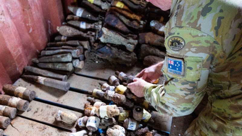 Warrant Officer Class 1 Adam Keys, from 6th Engineer Support Regiment, assesses World War 2 ordnance at the Explosive Ordnance Disposal facility at Hells Point in the Solomon Islands.