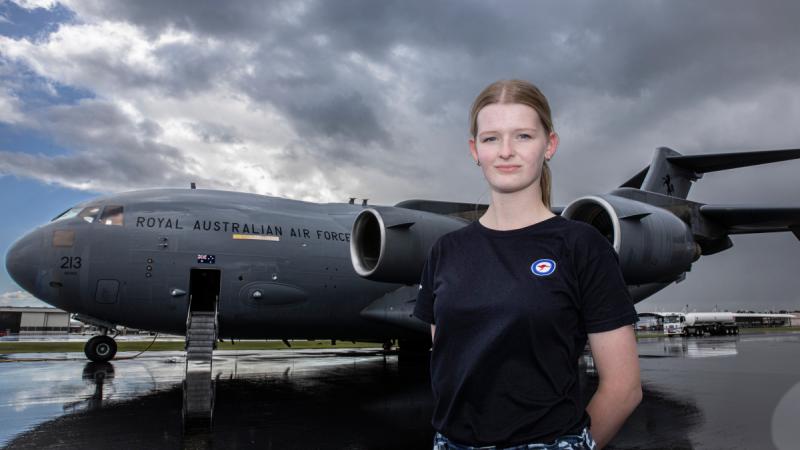 Jessica Sellers, a participant on the Air Force Women in Aviation Program visits the flight line at RAAF Base Williamtown during their tour of the base. 