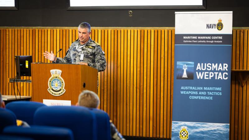 Captain Paul Johnson opens the inaugural Australian Maritime Weapons and Tactics Conference at HMAS Watson in Sydney.