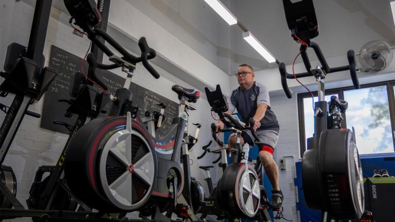 Squadron Leader Geoff Sanders warms up on a Wattbike at RAAF Base Glenbrook.