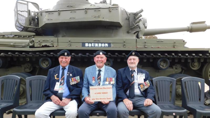 Left to right, former crew members of Centurion 169041, Barry Hodges, Graham Munsell and Ray Arthur out the front of in front of 1st Armoured Regiment at RAAF Base Edinburgh.