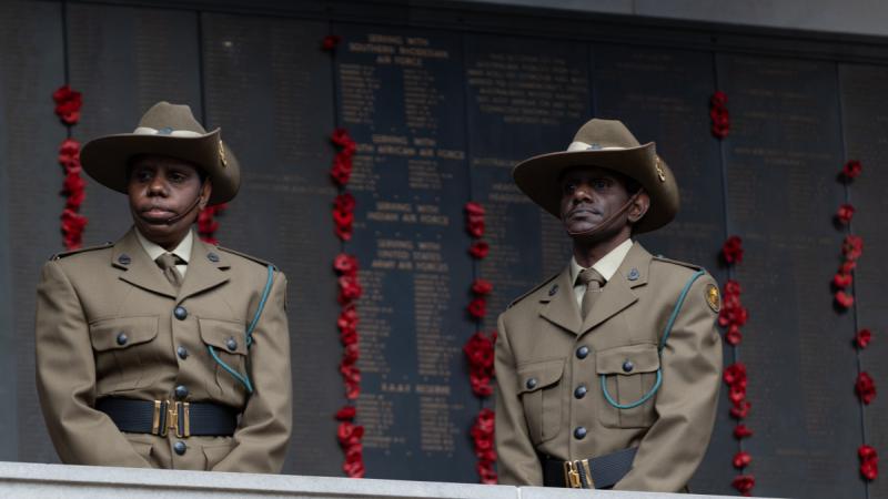 Private Arianna Yunkaporta and Private Irwin Yunkaporta, from 51st Battalion, Far North Queensland Regiment, attend the Australian War Memorial, Canberra, for the Last Post ceremony.