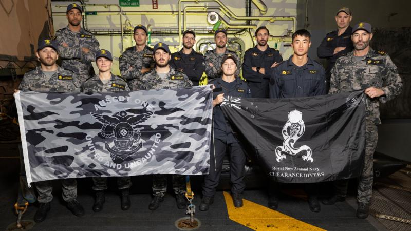 Royal Australian Navy and Royal New Zealand Navy Clearance Diving Teams onboard HMAS Canberra during a transit to Wellington, New Zealand.