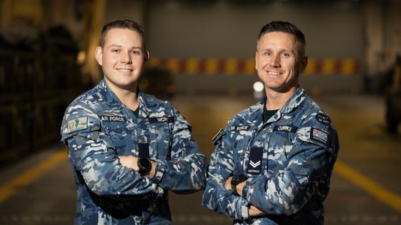 Air Force aviators Leading Aircraftman Jacob McNee, left, and Corporal Luke Corkery on board HMAS Canberra.