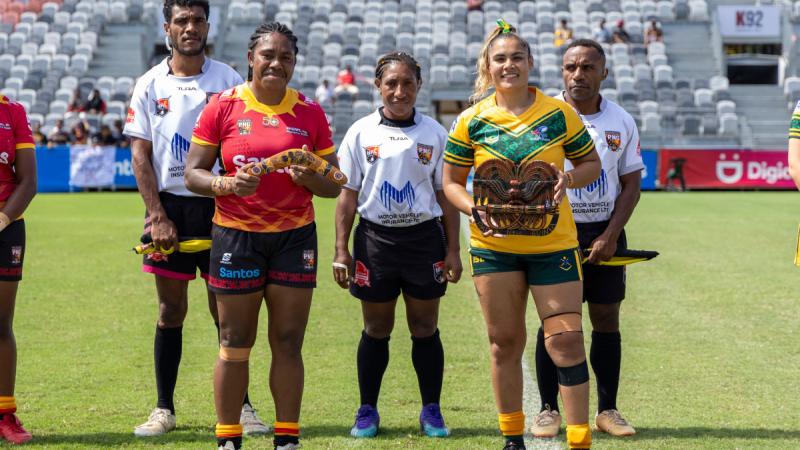  The Captain of the PNGRL Women's XIII, Belinda Gawasaman, with the captain of the ADF Women’s Rugby League team, Corporal Lowana McDougall, at Santos National Football Stadium in Port Moresby for the invitational match.
