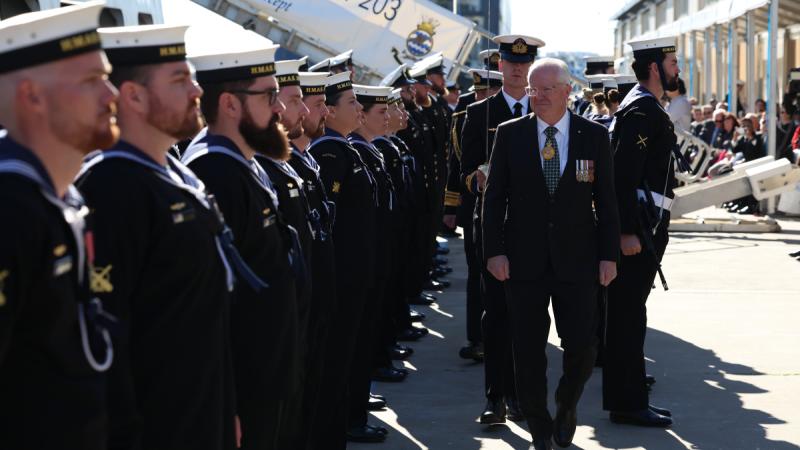 Governor of Western Australia, Chris Dawson, inspects the guard during the commissioning of HMAS Arafura at Fremantle, Western Australia.