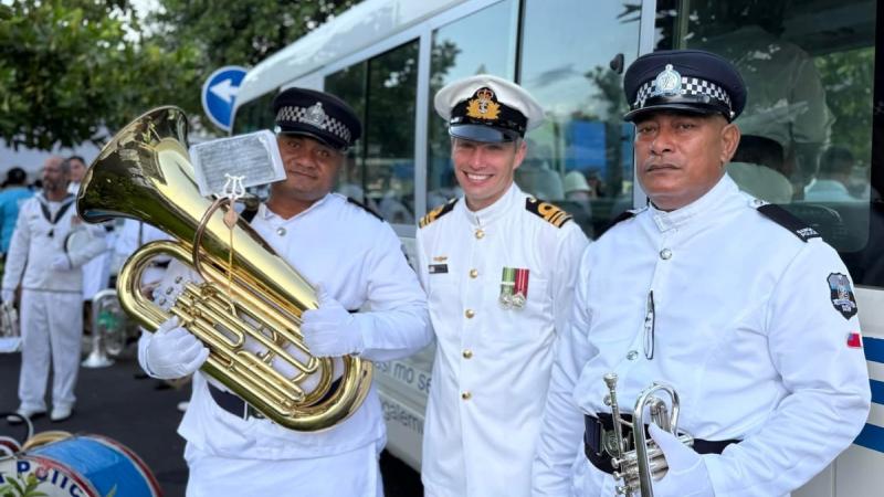 Lieutenant Commander Nathanael Maxwell, Officer In Charge, RAN Band Melbourne, joins members of the Royal Samoan Police Band, during Samoa's Independence Day celebrations.
