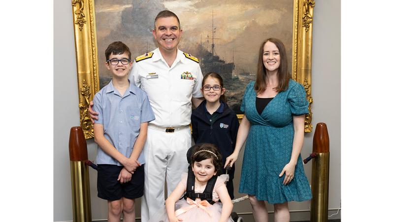 Commodore Dan Sutherland with his family, wife Rita and children Edward, Juliet and Evie.