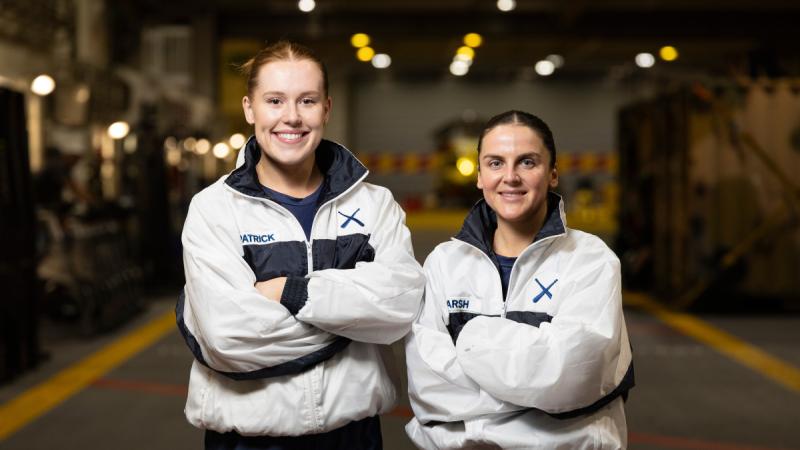 Navy physical training instructors Able Seaman Isabella Fitzpatrick and Leading Seaman Ally Marsh on board HMAS Canberra during a deployment to Wellington, New Zealand.