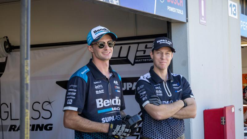 Craftsman Greg Cowan and Corporal Michael Drabble, from 13th Combat Service Support Battalion, standby to support professional drivers Nick Percat and Cameron Hill at the Supercars Perth Super 440 event.
