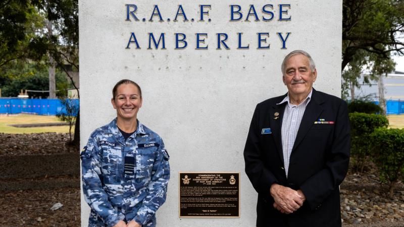 Wing Commander Tanya Evans with Warrant Officer (retd) George Hatchman, from the 23 Squadron Association, at the unveiling of RAAF Base Amberley's 85th Anniversary plaque. 