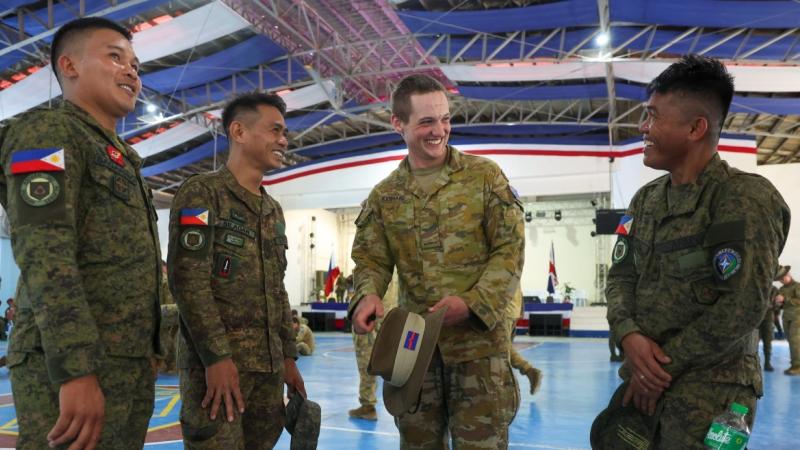 Australian Army soldier Gunner Marlin Kennard speaks to soldiers from the Philippine Army’s 4th Infantry Division at Camp Evangelista in Northern Mindanao.