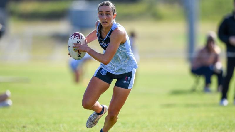 Leading Aircraftwoman Caylee Wallis playing for NSW Touch Football during the State of Origin competition in Coffs Harbour.