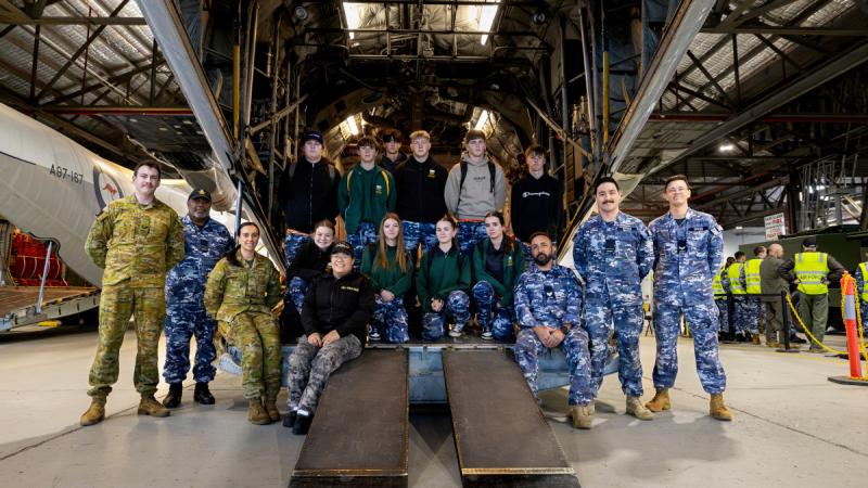 Indigenous Youth Program students check out the C-130E Hercules static training aircraft at RAAF Base Richmond, NSW.