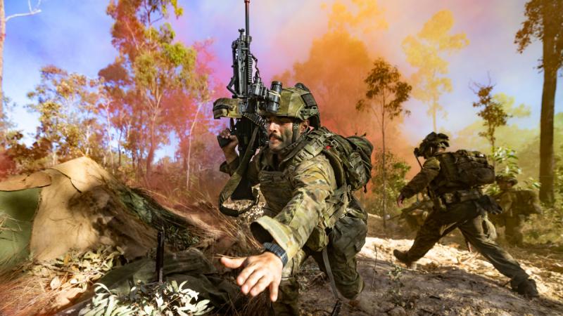 An Australian Army soldier from Battle Group Ram conducts a trench assault during the South Queensland Warfighter Exercise in preparation for Talisman Sabre.