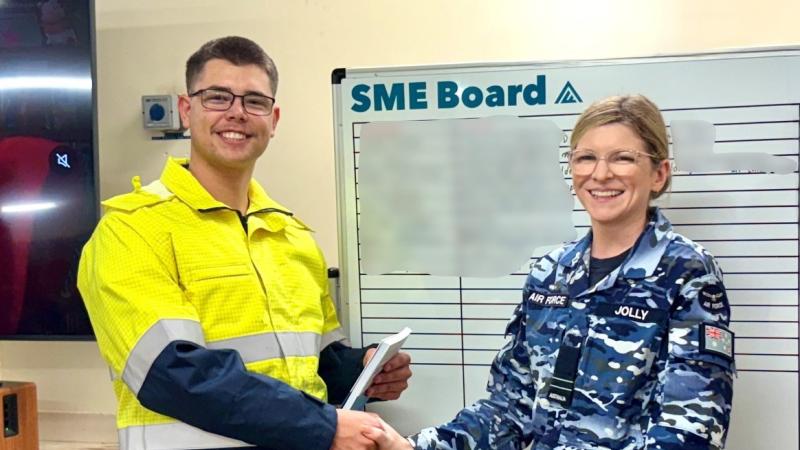 Aircraftman Cody Mann, the 200th member of EDGY lab at RAAF Base Williamtown, is welcomed by Lab Ambassador Flight Lieutenant Loretta Jolly. 