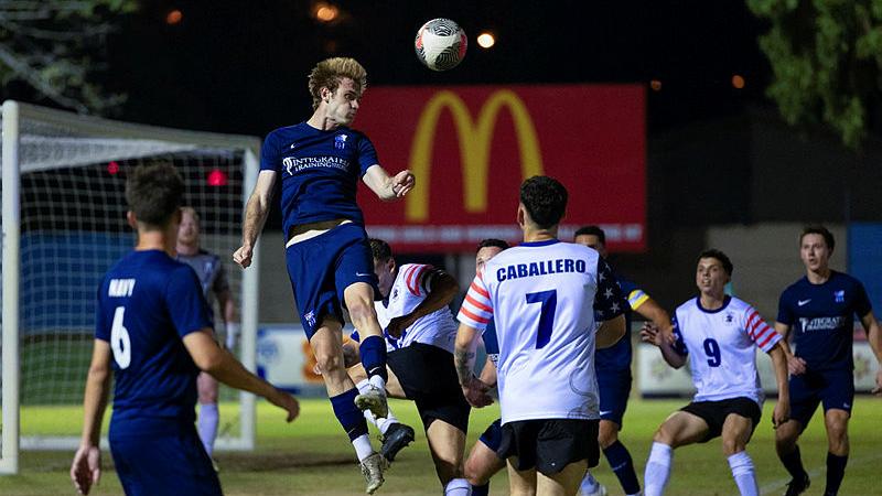 Royal Australian Navy and United States Marine Rotational Force – Darwin men’s soccer teams compete during a July 4 soccer match held at Darwin Football Stadium, NT.