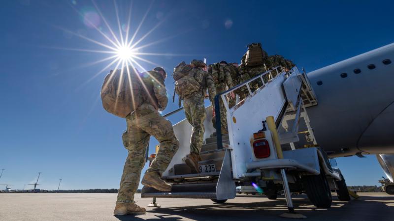 Australian Army Reserve soldiers from 41st Battalion, Royal New South Wales Regiment, board a Royal Australian Air Force KC-30 aircraft at RAAF Base Amberley in Queensland to deploy to northern Western Australia as part of Exercise Talisman Sabre. 