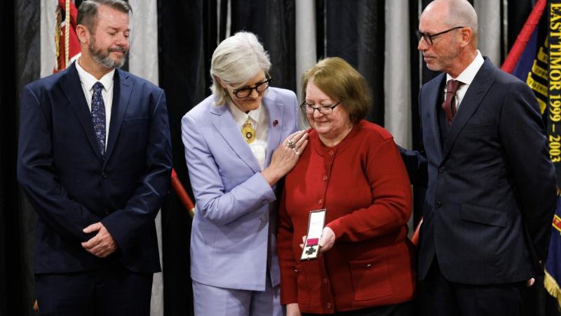 Governor-General of the Commonwealth of Australia, Her Excellency the Honourable Sam Mostyn, presents a posthumous Victoria Cross for Australia to Robynn Freeman, the widow of the late Private Richard Leslie Norden VC.
