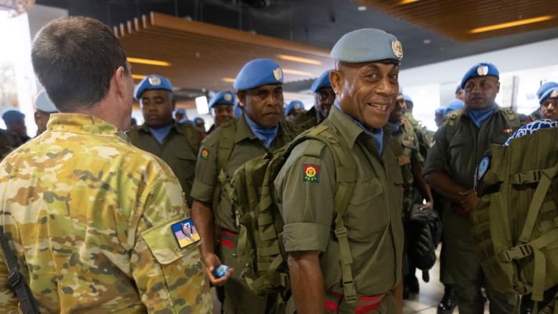 Australian Defence Force movements personnel assist the Republic of Fiji Military Forces (RFMF) during the ADF strategic airlift of an RFMF contingent for a deployment to the Middle East region.