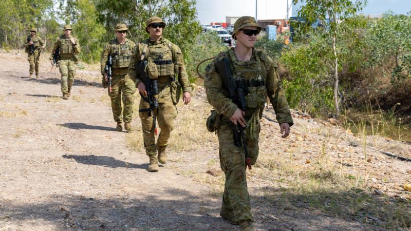 Australian Army Reserve soldiers from 5th/6th Battalion, Royal Victoria Regiment, and 22nd Engineer Regiment conduct a patrol through East Arm in Darwin during Exercise Talisman Sabre 2025.