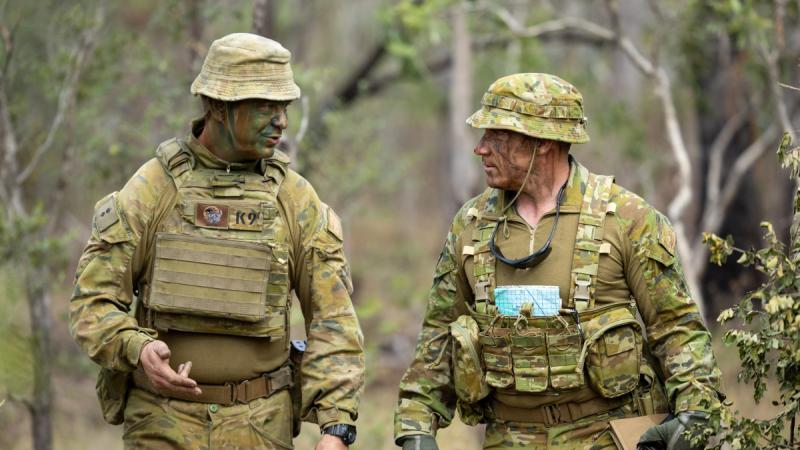  Commanding Officer of 8/9 Battalion, the Royal Australian Regiment, Lieutenant Colonel Andrew Raven, left, discusses lessons learnt with Commandant Land Combat College, Brigadier Andrew Moss, during Exercise Talisman Sabre 2025. 