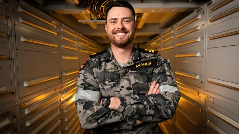 Lieutenant Christopher McHugh in the stores room on board HMAS Sydney.