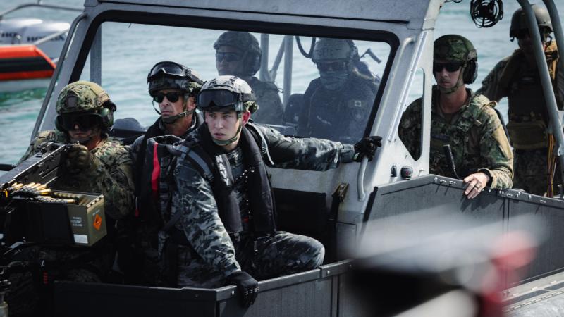Royal Australian Navy sailors prepare to board a vessel from a US Coast Guard transportable port security boat in Darwin Harbour during Exercise Talisman Sabre 2025.