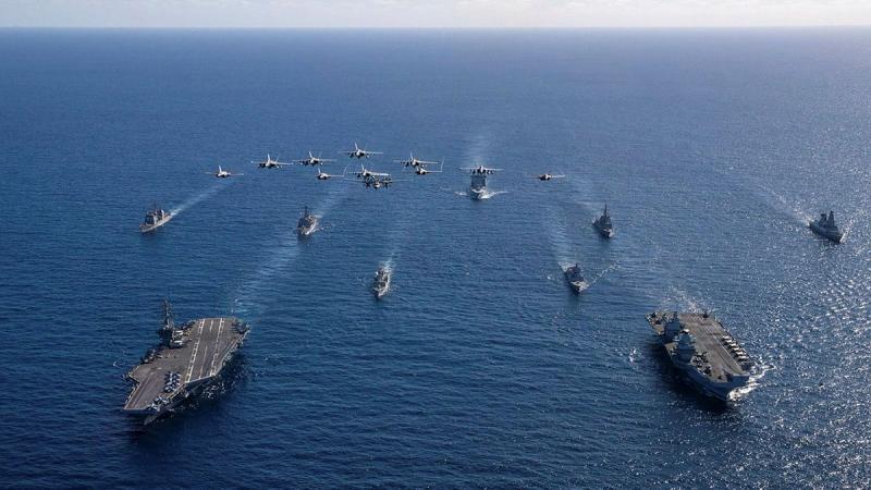 HMAS Sydney transits as part of a double carrier formation during Exercise Talisman Sabre. Photos: Leading Seaman David Cox