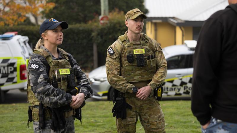 Members of the Joint Military Police Unit use Body Worn Cameras.
