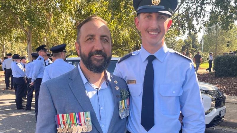 Sergeant Ronald Schultz and his son,  fourth-generation defence member Aircraftman Zaylan Schultz.