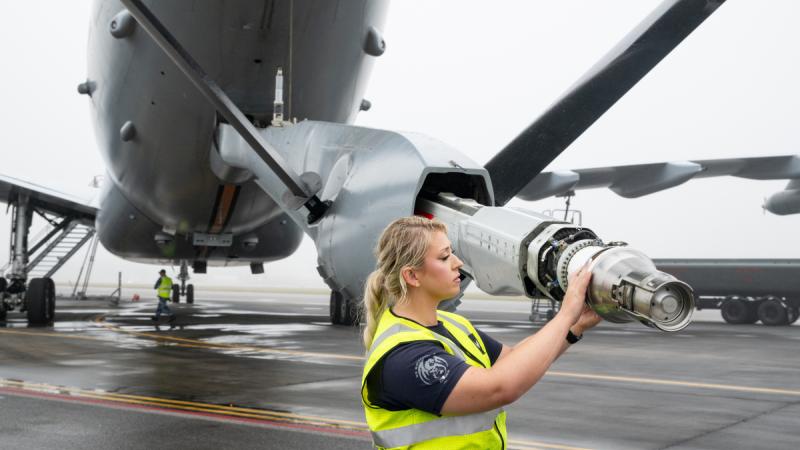 Royal Australian Air Force aircraft technician Corporal Aisha Norton-O'Donnell inspects the advanced refuelling boom system of a 33 Squadron KC-30A multi-role tanker transport aircraft, during trials with the US Air Force.e