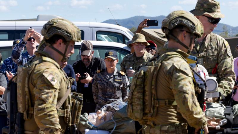 Surgeon General of the Australian Defence Force, Rear Admiral Sonya Bennett, and VIPs observe a triage demonstration by the 2nd Health Battalion at Camp Tilpal in Shoalwater Bay as part of Exercise Talisman Sabre 2025.
