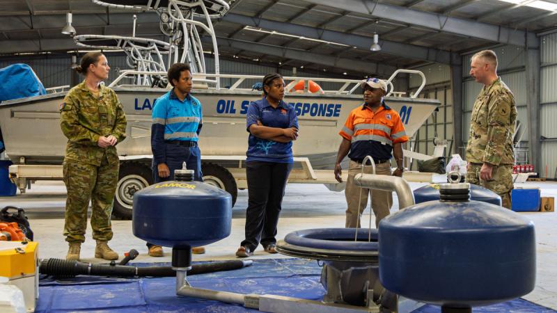 Participants visit an oil spill warehouse as part of humanitarian assistance and disaster relief training during Exercise Pacific Partnership 2025 in Papua New Guinea.